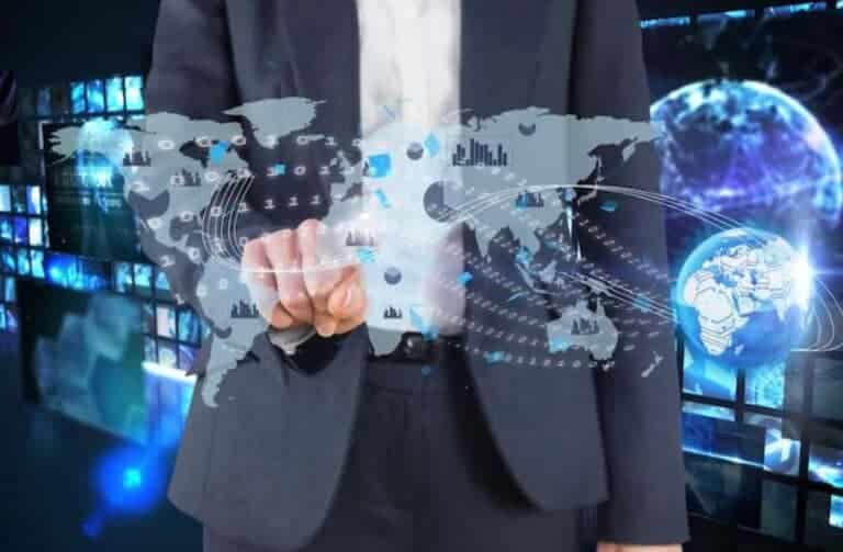 Businessperson interacting with virtual global technology interface map