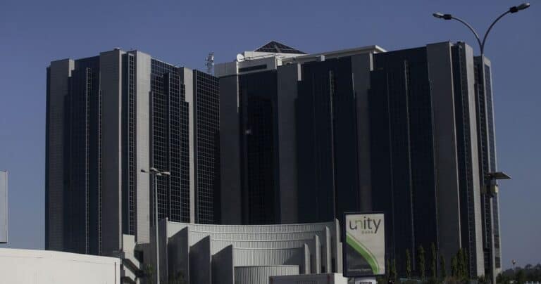 Modern glass office building with Unity Bank sign