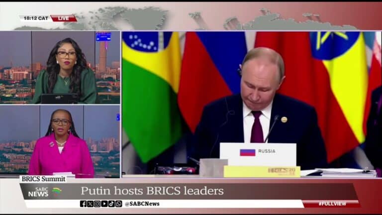 News broadcast showing BRICS summit and Russian official